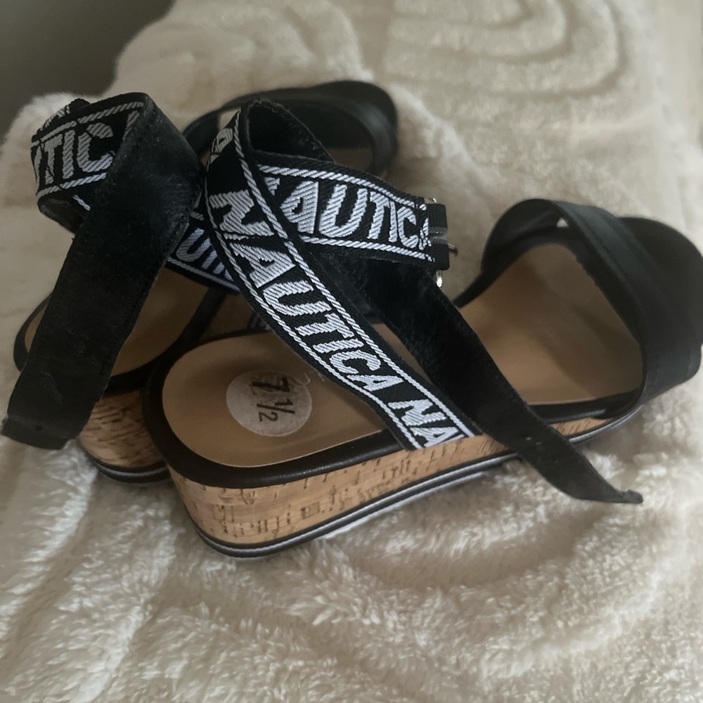 Black and white Nautica sandals